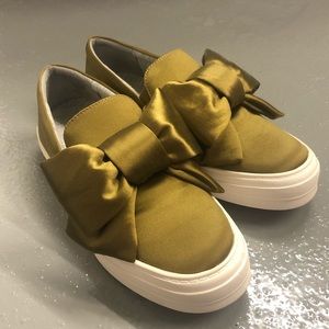 Gold Nine West bow sneakers